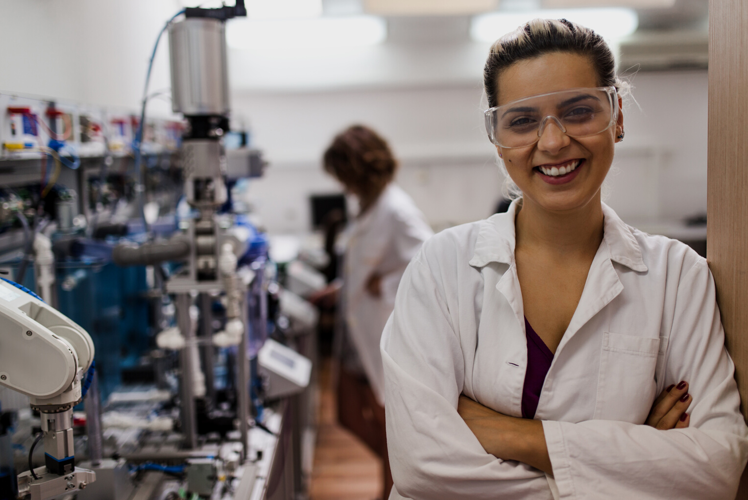 Successful young female engineer in the lab